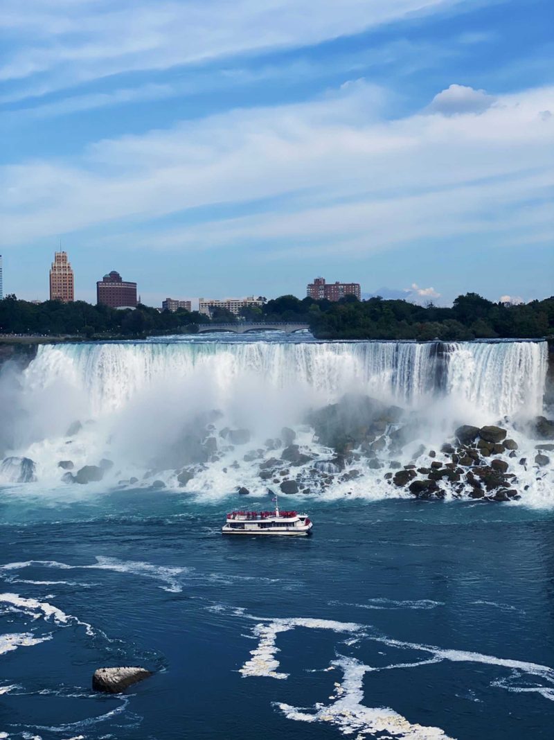 Niagara City Cruises boat heading toward Horseshoe Falls on the Best of Niagara Falls Tour, Canada