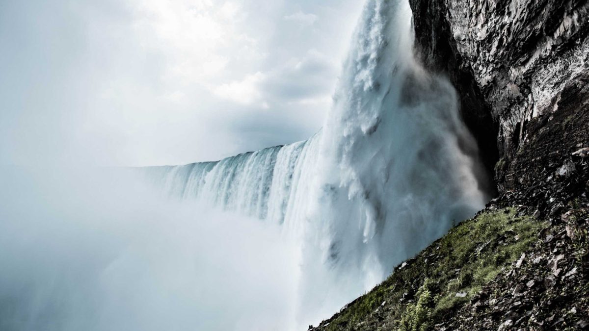 The curtain of the Horseshoe Falls seen close up from the Journey Behind the Falls deck