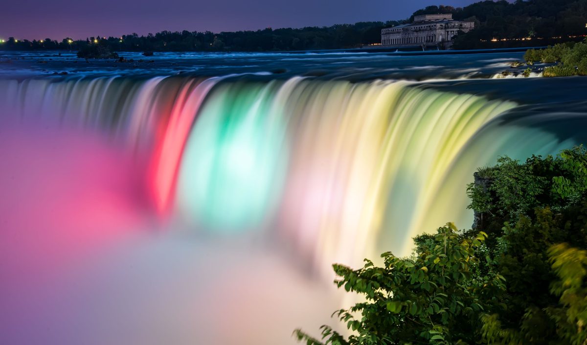 The Horseshoe Falls lit in colour during the nightly illumination