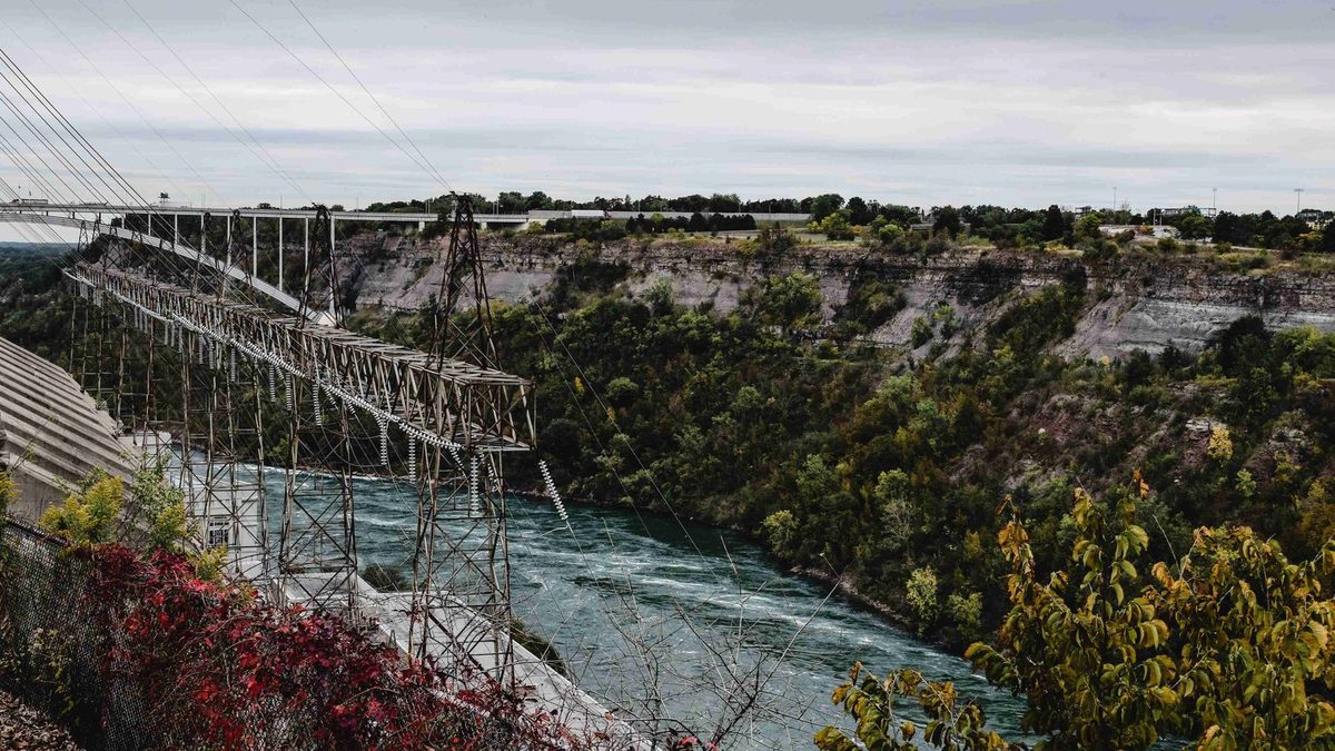 The Niagara gorge and whirlpool ringed by trees in full autumn colour